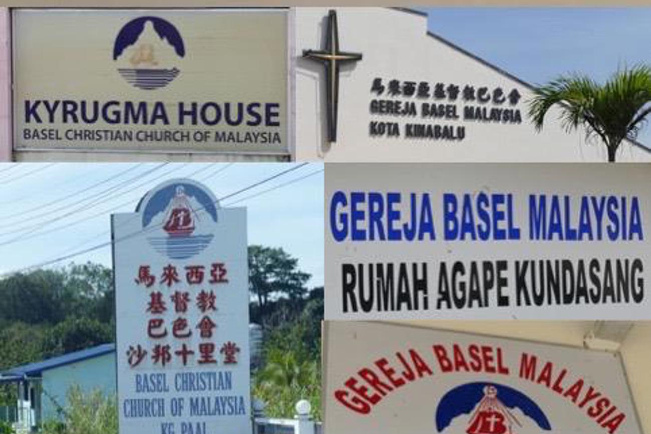 Überall findet man "Basel" auf Kirchen-Schildern.